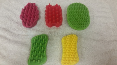 Rubber/Silicone brushes are great to use on short to medium coats, and during the bath. 